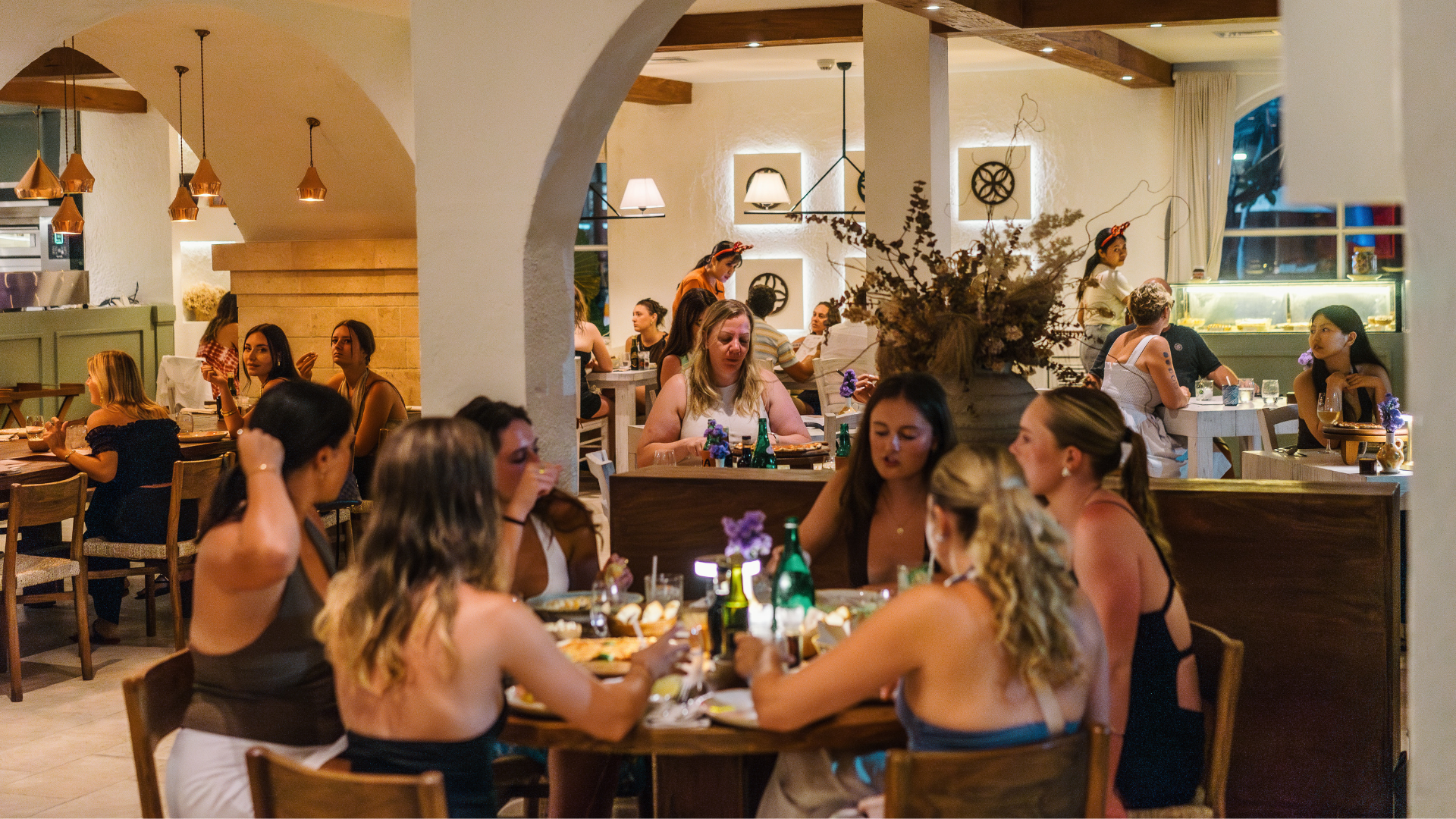 people gather in zia tina for easter dinner